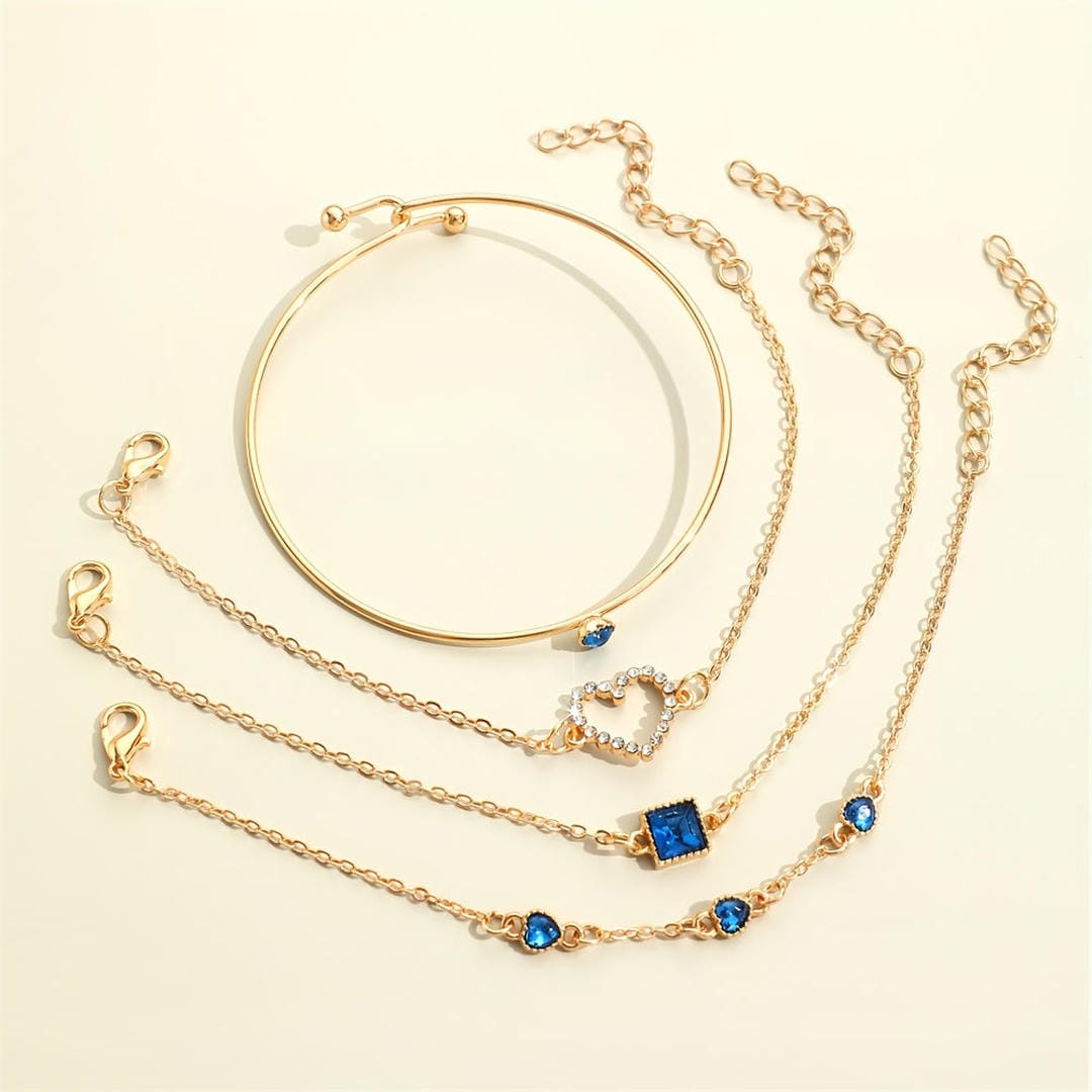 Parure de bracelets Coeurs Dores Saphir