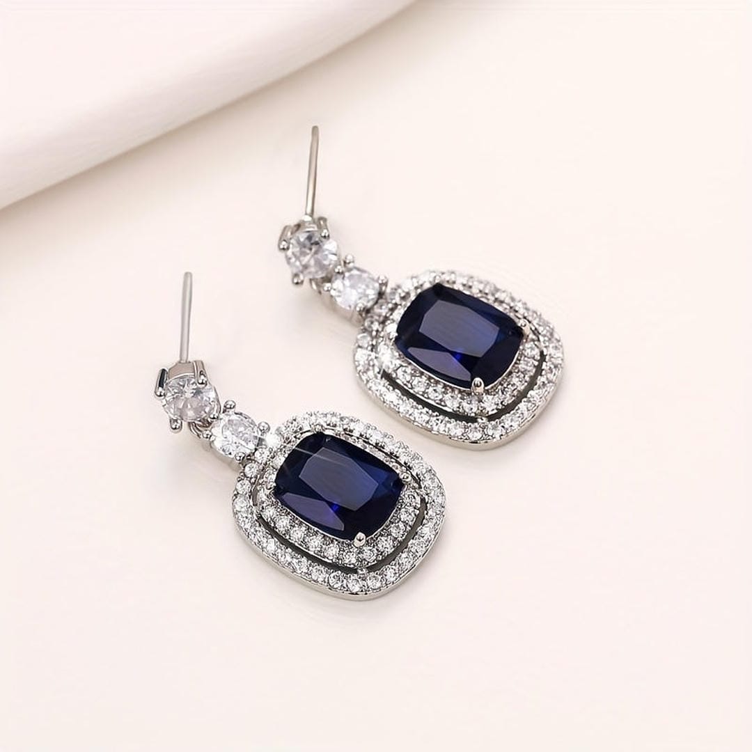 Boucles d'oreilles ovales saphir pavees de zircone
