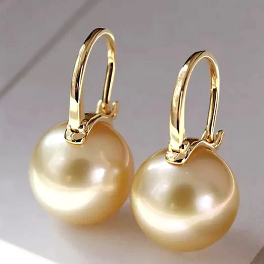 Boucles d'oreilles™ | Élégance en perles dorées