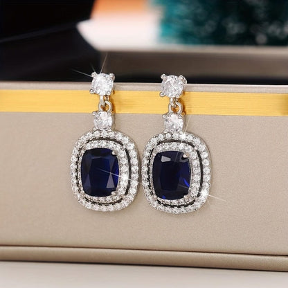 Boucles d'oreilles ovales saphir pavees de zircone