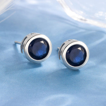 Clous d'oreilles saphir sertis clos