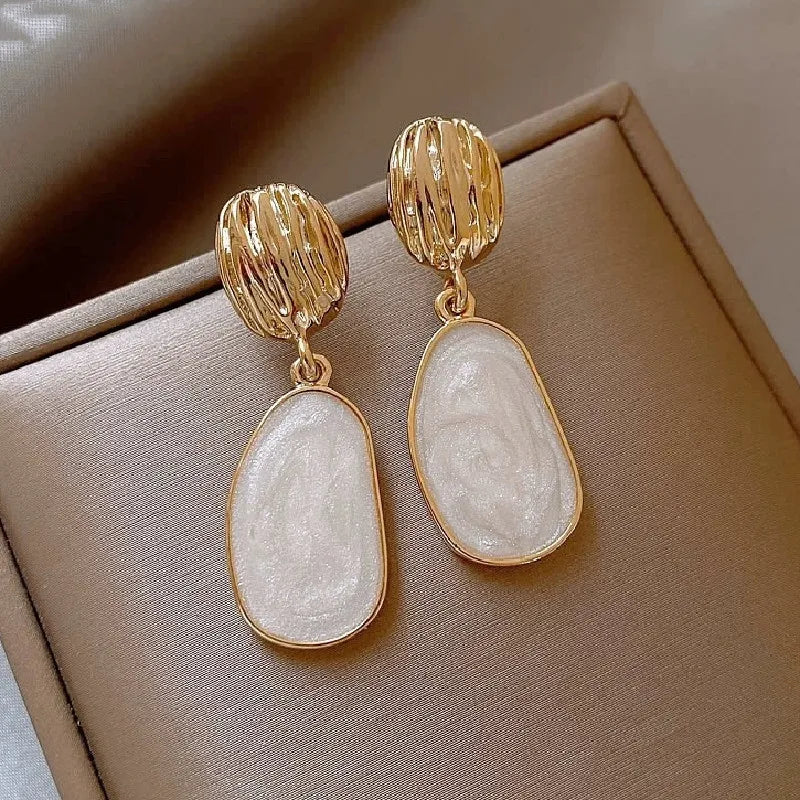 Boucles Ovales™ | Élégance en émail vintage
