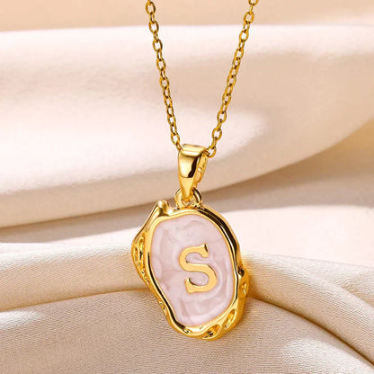 Collier océan plaqué or 18 carats avec initiales au fond de la mer