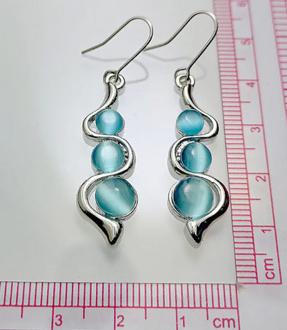 Éclat Bleu™ | Boucles d'oreilles pendantes en cristal